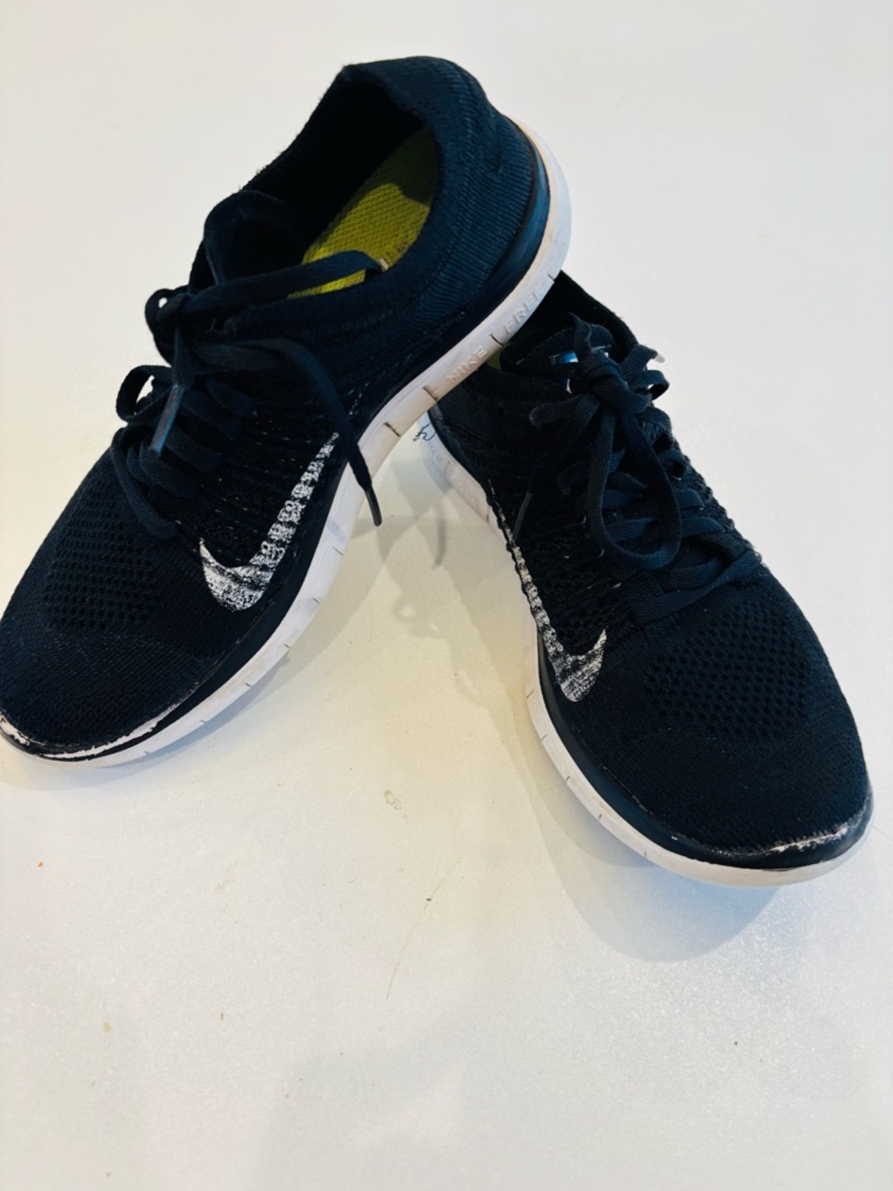 Nike Women’s Black Knit Sneakers with White Swoosh size 7.5